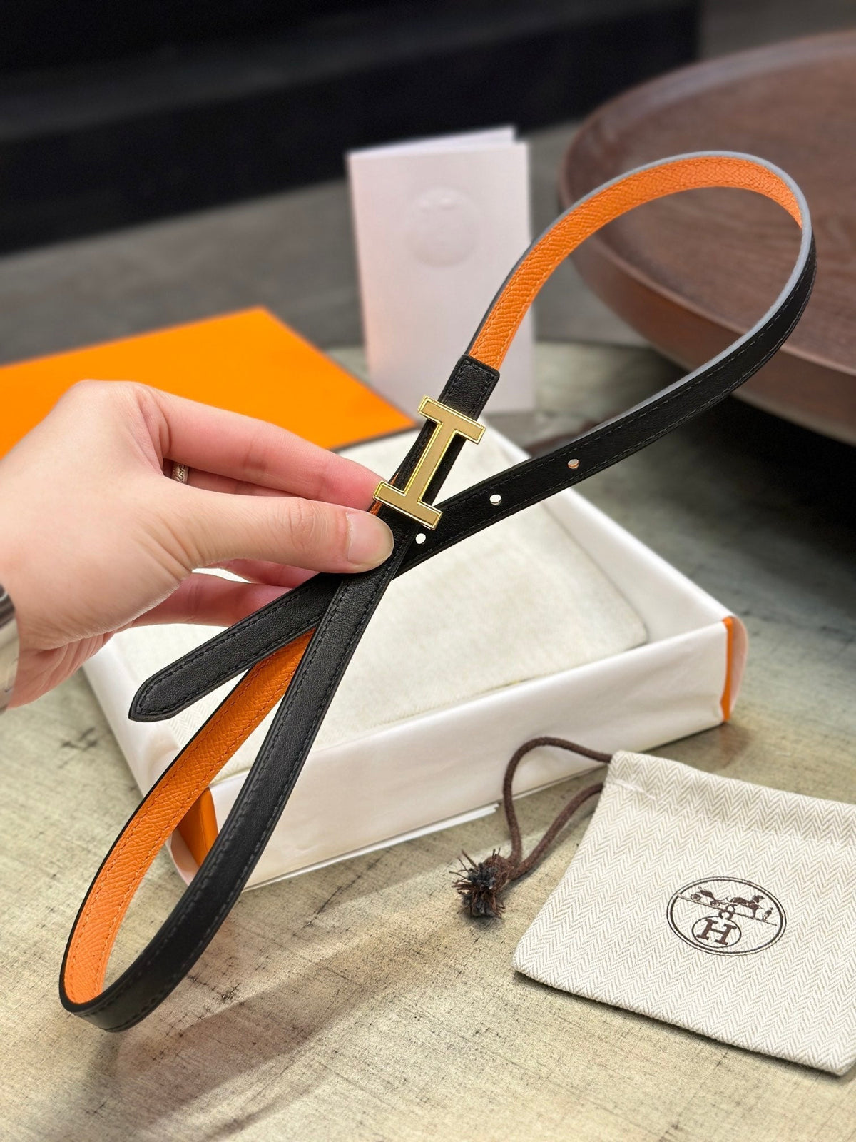 HERMES FOCUS BUCKLE & REVERSIBLE BLACK AND ORANGE LEATHER STRAP 13MM GOLD HARDWARE
