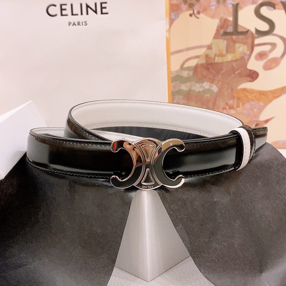 CELINE 25S BELT 25MM REVERSIBLE TRIOMPHE IN BLACK WHITE CALFSKIN 565542